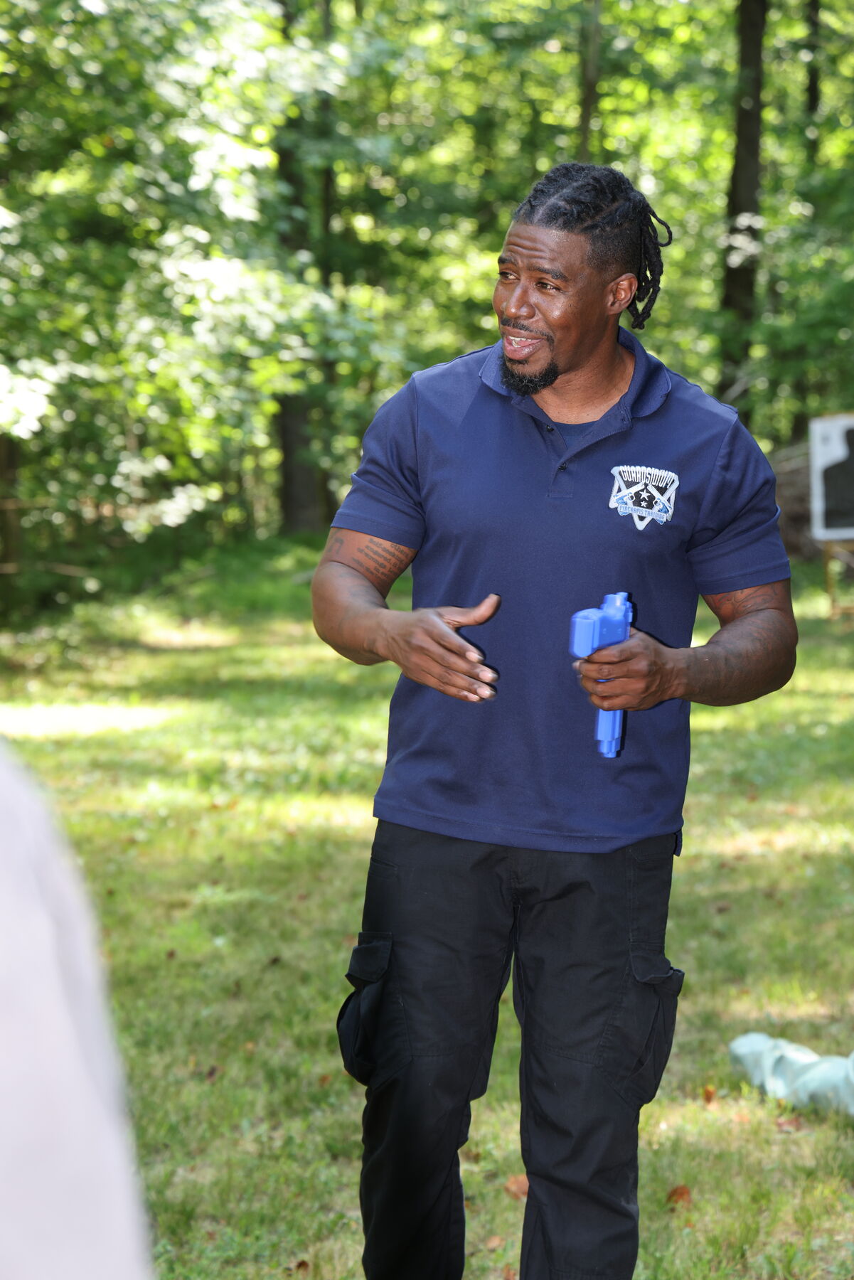 Instructor reinforcing range safety