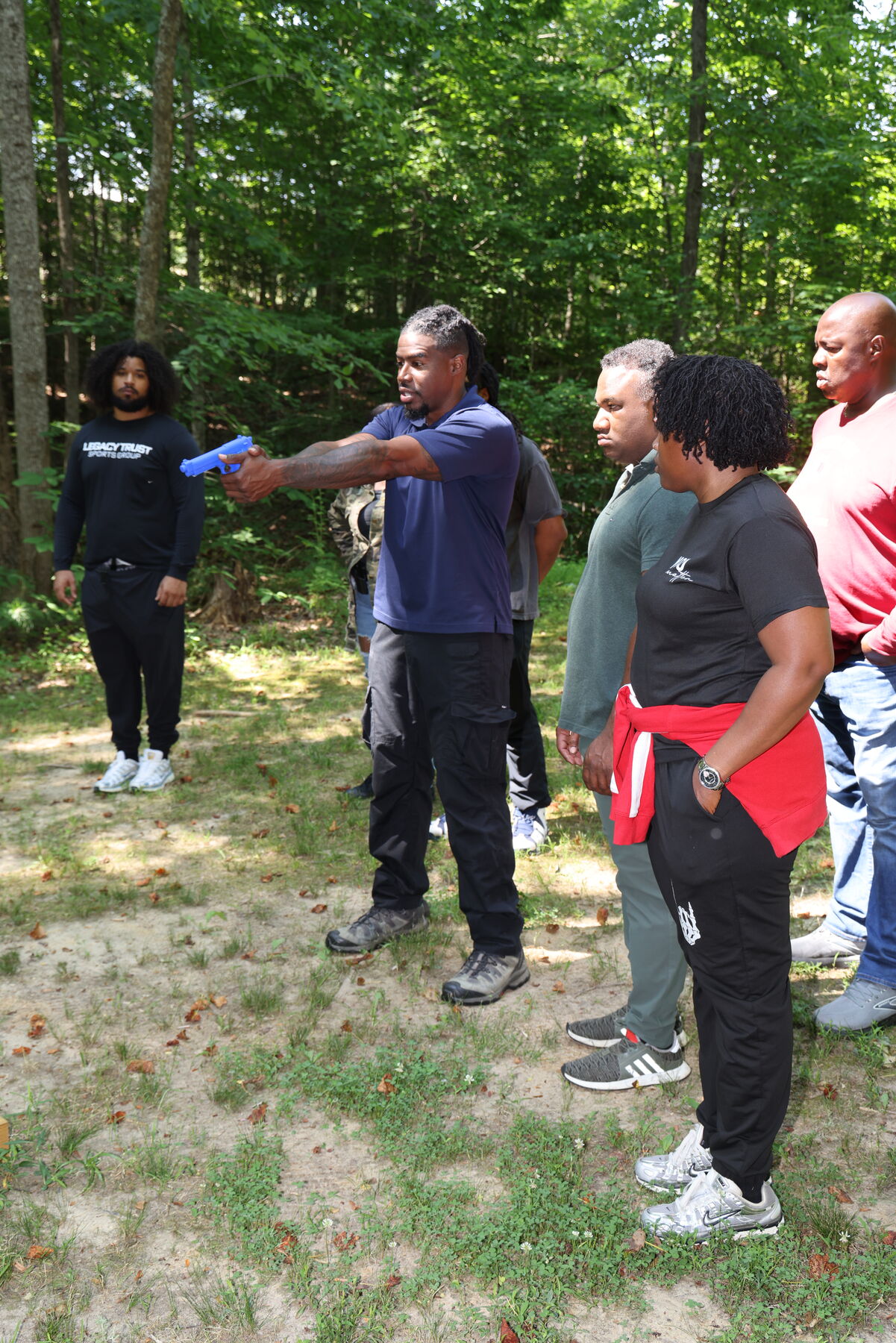 Instructor delivering a safety brief at the range