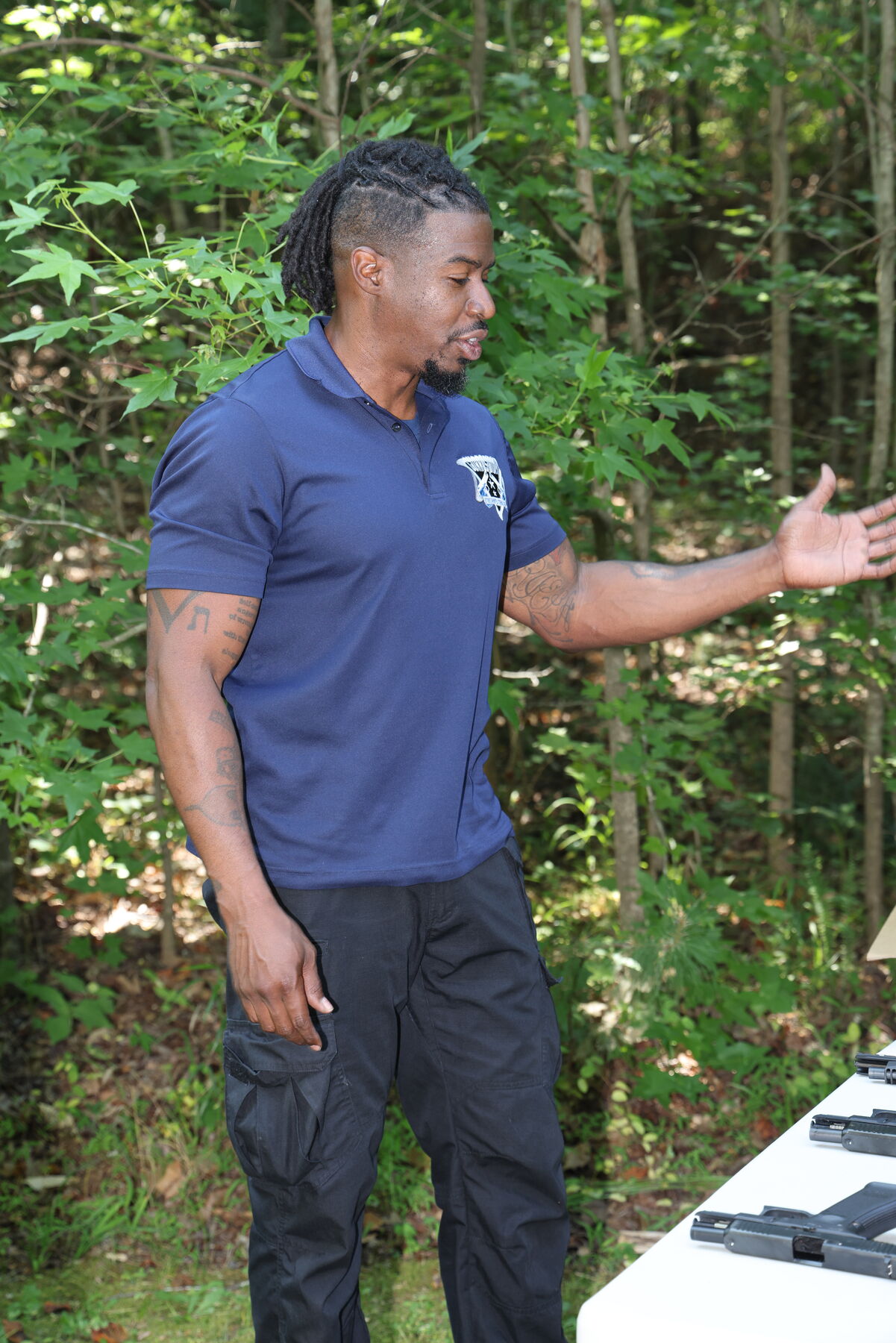 Instructor guiding the class on the range
